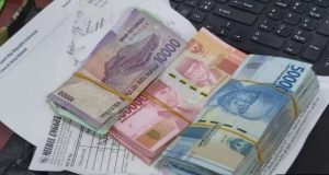 Bisakah Uang Sebarkan Virus Corona? Ini Kata Ahli Kesehatan